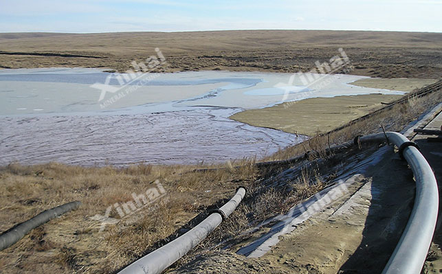 Gold mine tailings pond stacking